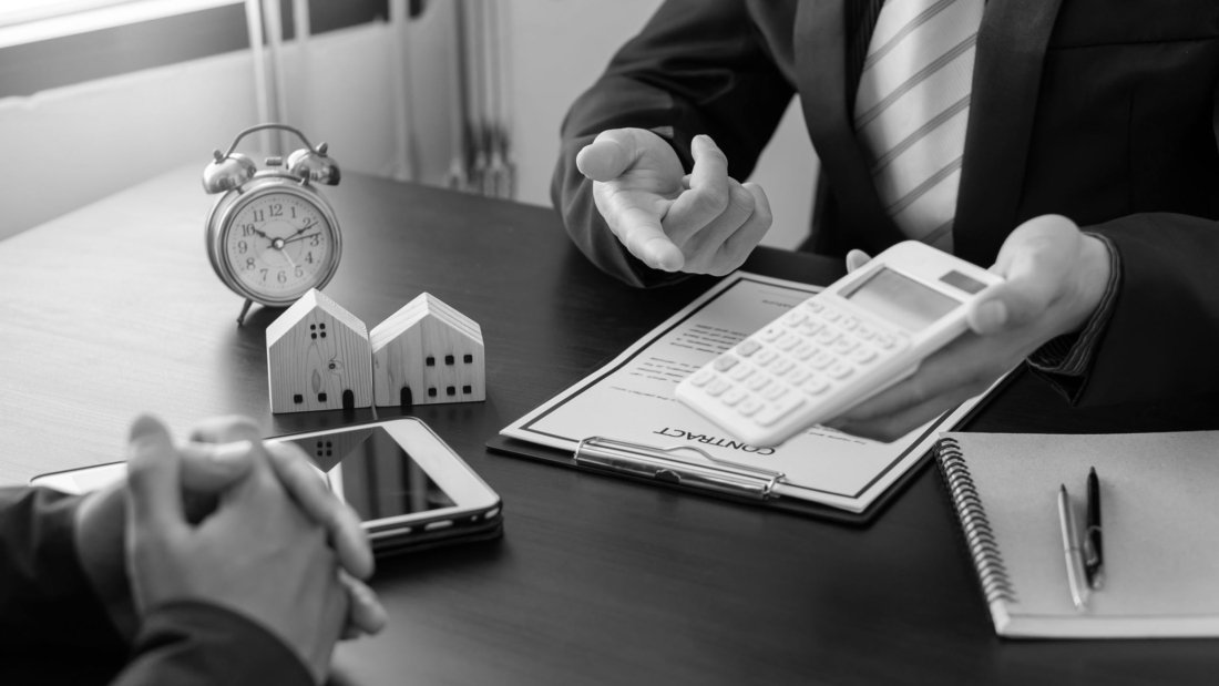 Calculator In the hands of the broker, the property agent is sug